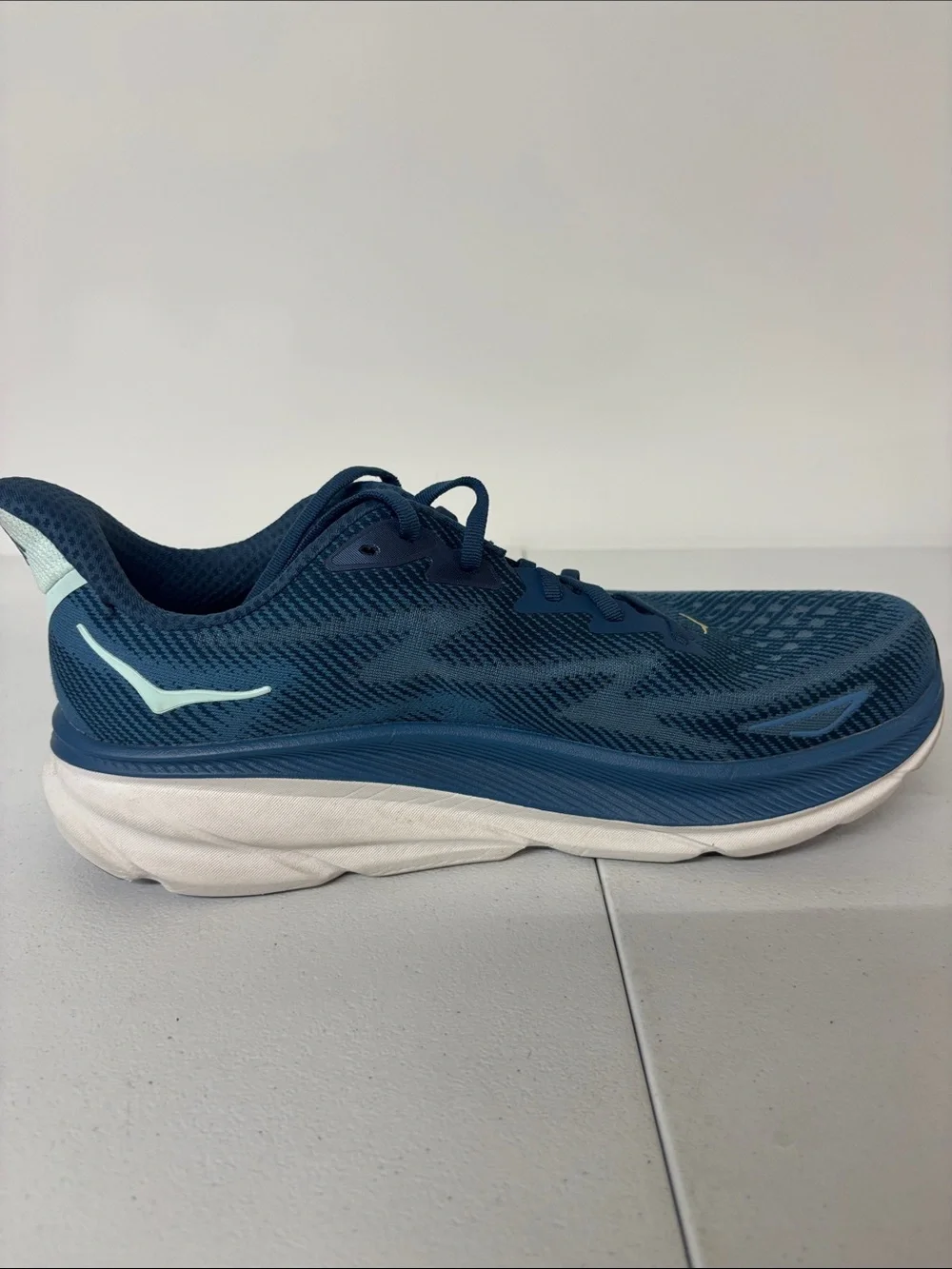 Hoka Blue Running Shoes with Yellow Logo
